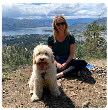 Photo of Dr. Erica Volk and her white, fluffy dog Rosie